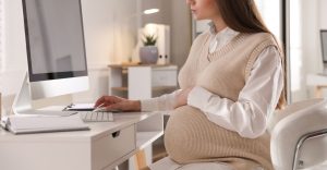 Pregnant lady using a computer